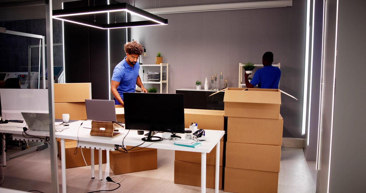 IT professionals helping with office move
